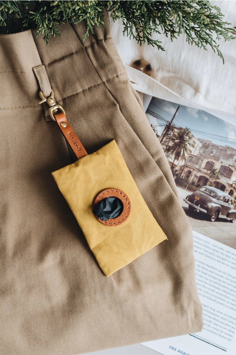 Zoom sur l’ouverture circulaire du support NOI pour une distribution pratique des sacs
